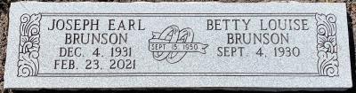 companion granite headstone with wedding rings ribbon